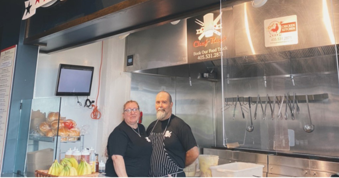 Chef Raymond Wilson and his wife in their kitchen