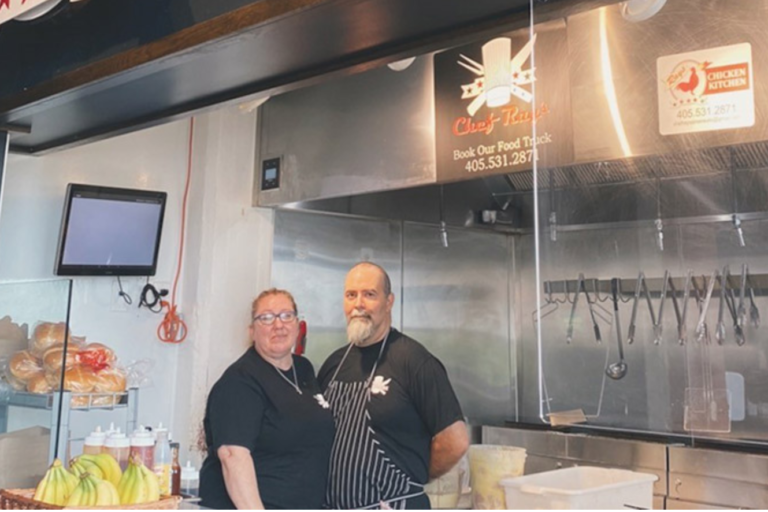 Chef Raymond Wilson and his wife in their kitchen