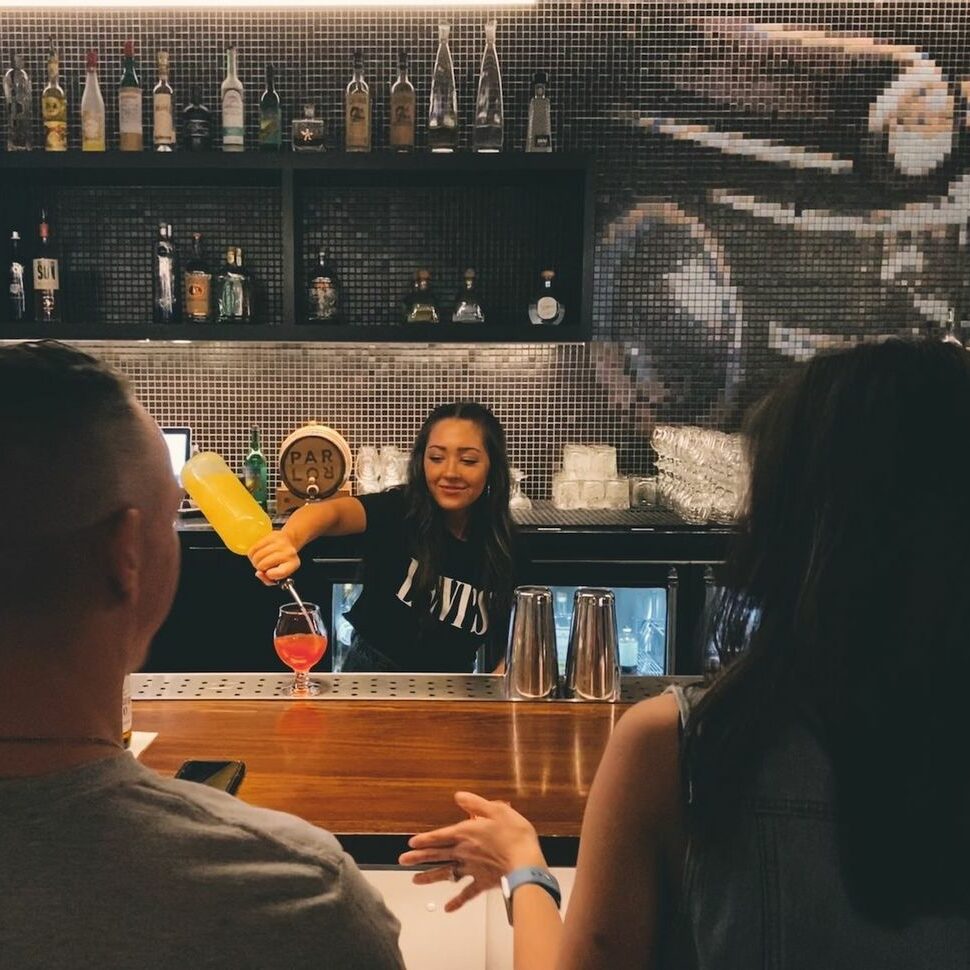 Bartender pouring a drink