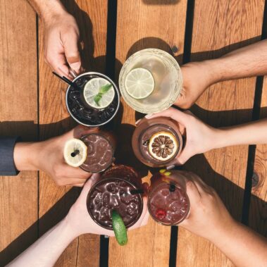 People having a cheers with cocktails