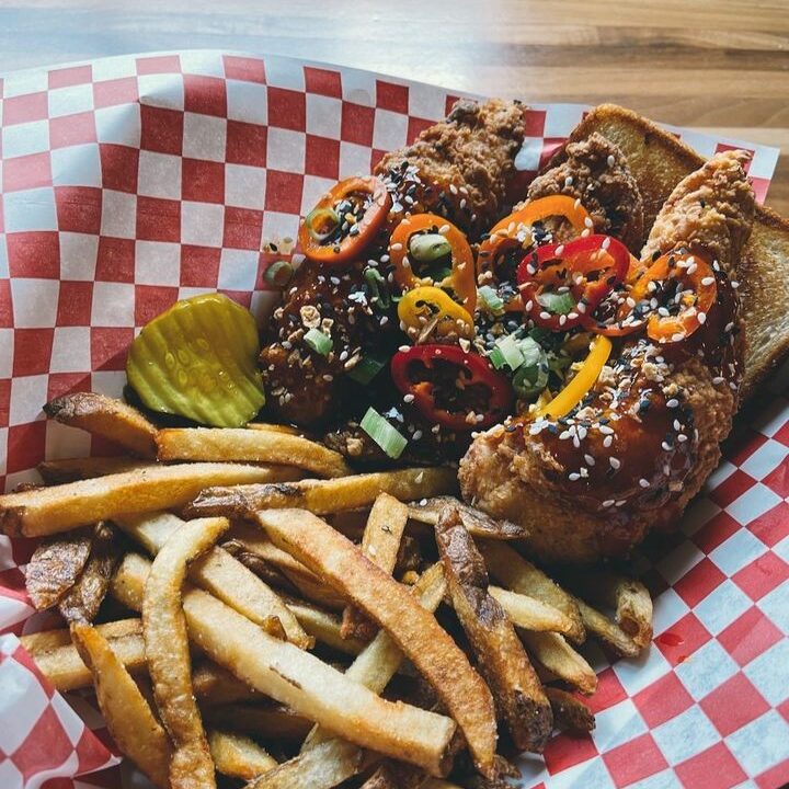 A basket of fried chicken and fries